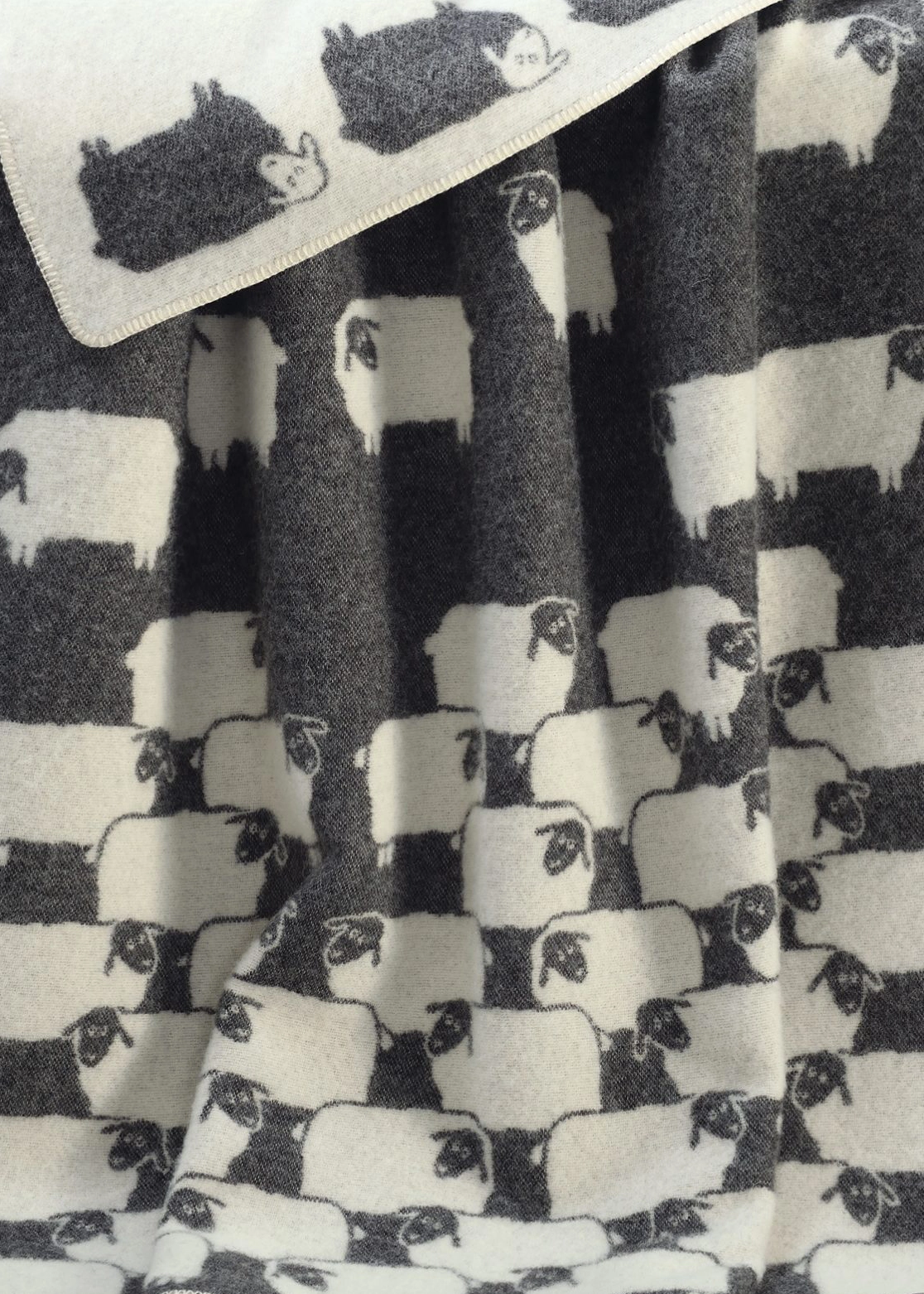 monochrome herd of sheep wool throw